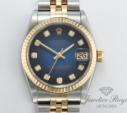 Uhransicht von vorne, hauptsächlich das Zifferblatt und die Lünette sichtbar. Rolex Medium Datejust Stahl Gelbgold 750 Diamanten Automatik Gold Stahl