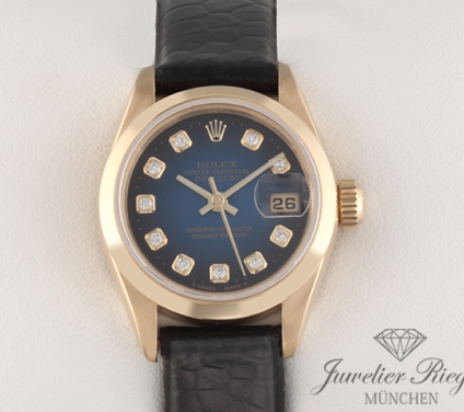 Uhransicht von vorne, hauptsächlich das Zifferblatt und die Lünette sichtbar. Rolex Lady Datejust Gelbgold 750 Diamanten Automatik Lederband Gold Damenuhr