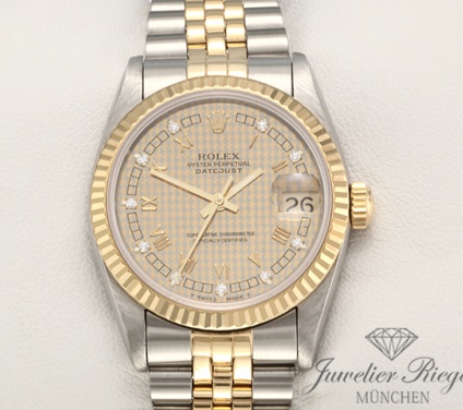 Uhransicht von vorne, hauptsächlich das Zifferblatt und die Lünette sichtbar. Rolex Medium Datejust 31 mm Stahl Gelbgold 750 Diamanten Automatik