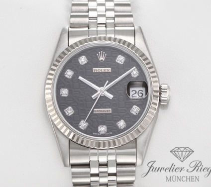 Uhransicht von vorne, hauptsächlich das Zifferblatt und die Lünette sichtbar. Rolex Medium Datejust 31 mm Stahl Weissgold 750 Diamanten Automatik Gold